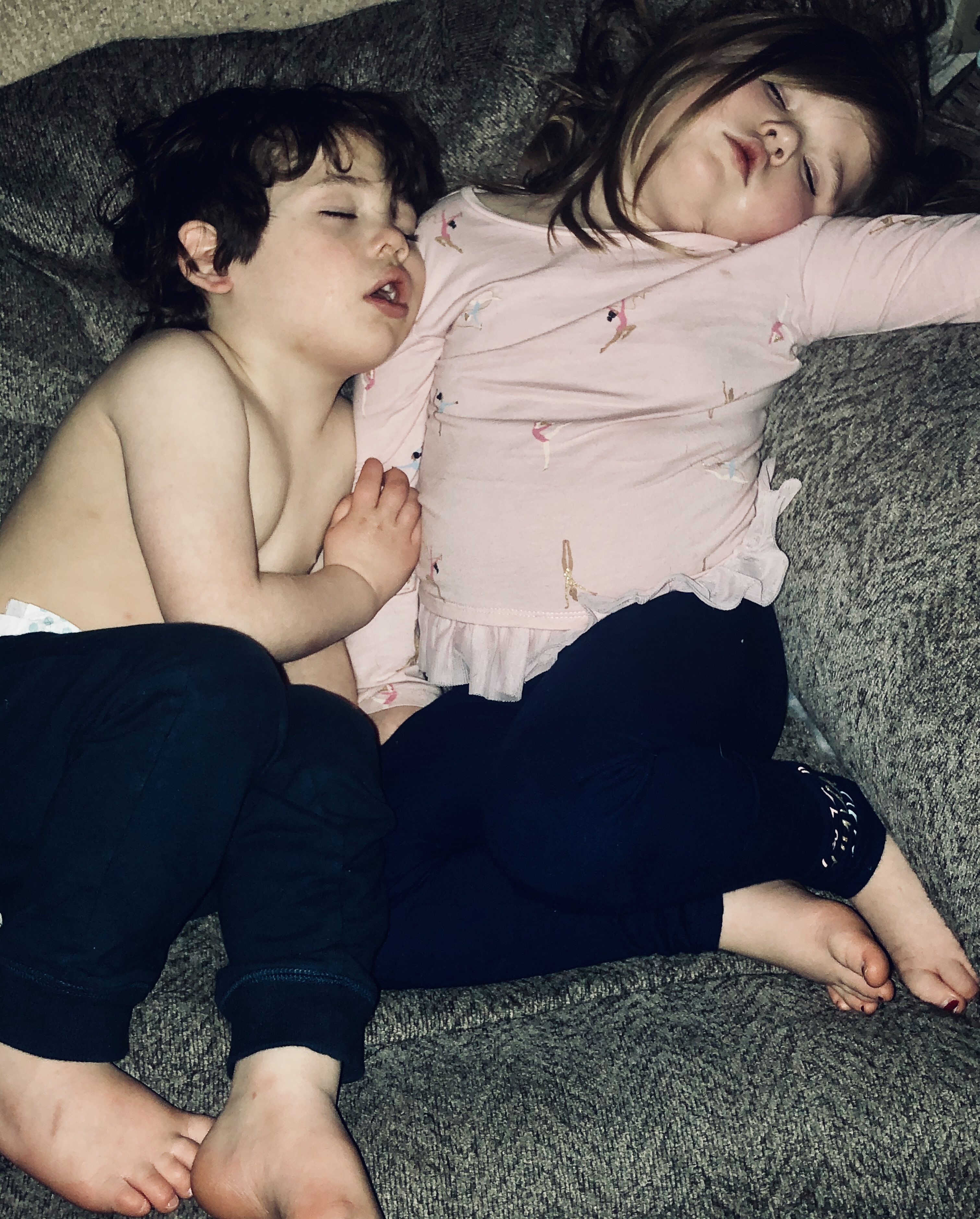 Only way he will sleep- cuddling with sissy